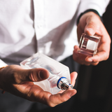 Assortment of top-rated men's colognes displayed in an elegant setting, showcasing a variety of premium and best-selling fragrances